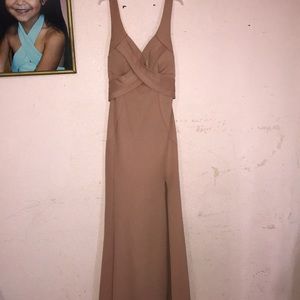 Dress, long body-con dress slit on the left side.